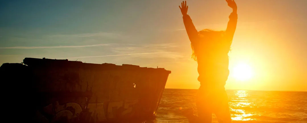 celebrate-life-the-journey A person jumping for joy in the sunrise - enjoy the journey